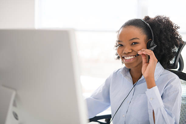 istock black business woman using laptop computer in office. 2219616721