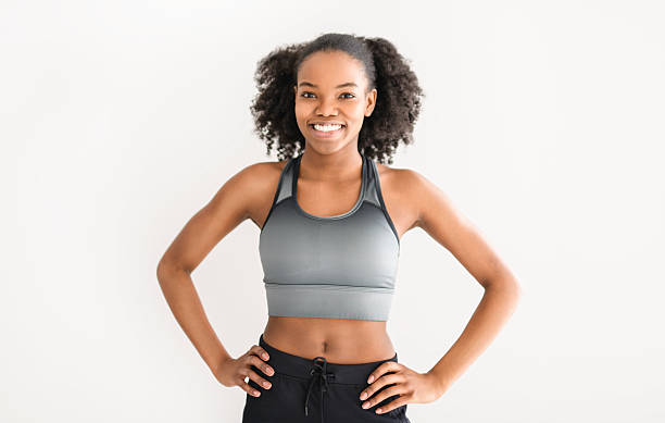 istock attractive black american woman training at home 2219616973