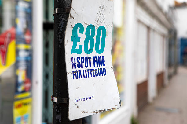 Plastic, bottles, cans, paper and glass, written on a recycle bin on a street in Norwich