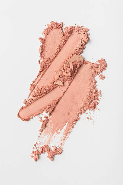 istock Crushed pink blush powder smeared on white background 2219620018