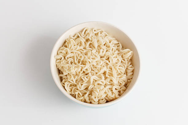 istock Cooked Asian Noodles in Bowl, Studio Shot, Isolated 2219620259