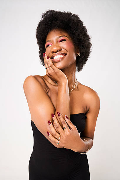 A young african woman with natural hair in studio