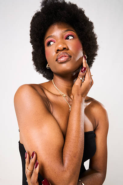 istock Young Woman In Studio With Natural Afro 2219621274