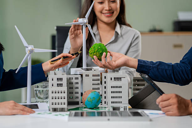 istock Engineer Teamwork Meeting, with partner on model building at company office working technology, Renewable energy-based green businesses and global warming 2219621928