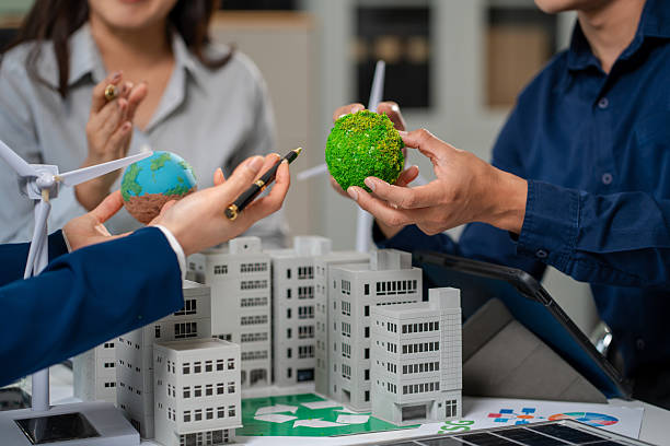 istock Engineer Teamwork Meeting, with partner on model building at company office working technology, Renewable energy-based green businesses and global warming 2219621936