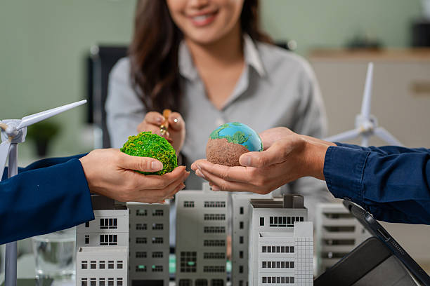 istock Engineer Teamwork Meeting, with partner on model building at company office working technology, Renewable energy-based green businesses and global warming 2219621938