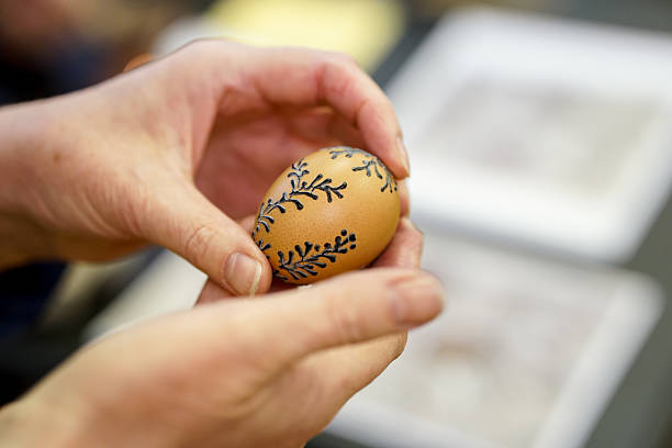 Holiday decoration of Easter eggs. Drilling process.