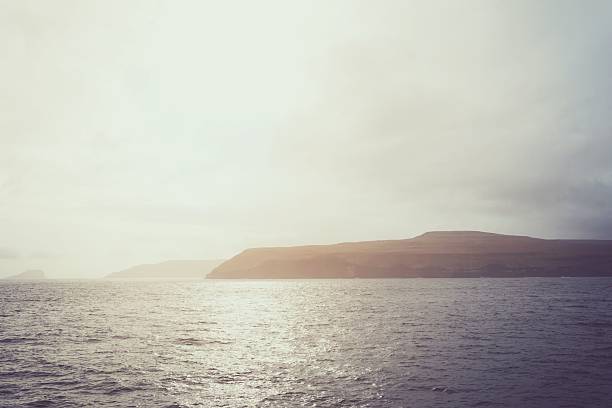 Scenic view of the Faroe Islands bathed in gentle sunlight