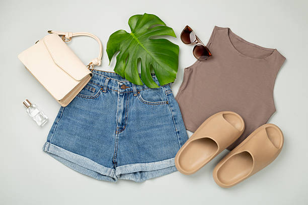 istock Flat lay with casual summer outfit on color background, top view 2219629299
