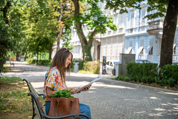 The two friends enjoy a peaceful moment while planning their visit and sharing travel experiences.
