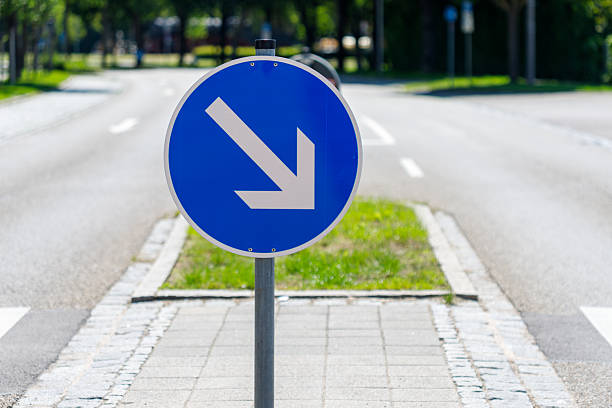 istock Road Sign with Downward Diagonal Arrow 2219631819