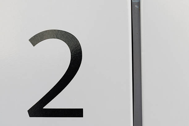 istock Black Number Two on White Background with Gray Line 2219631853