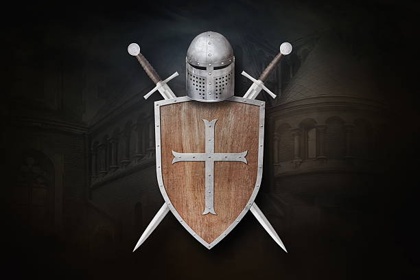 istock knight's helmet shield and two crossed swords on dark background 2219632534