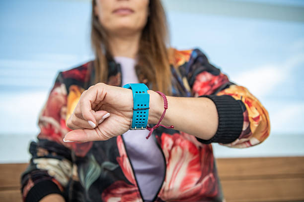 woman-wearing-smart-watch-hand-close-up.