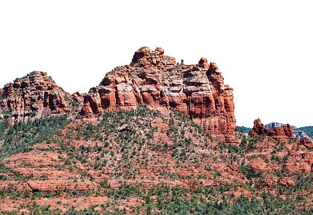 Rugged red rock formation isolated as transparent png.