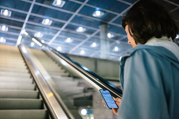 istock young woman use mobile app for investing 2219637503