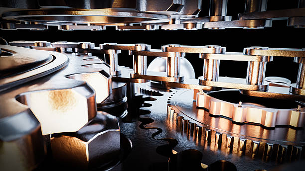 istock Complex gear system rotating with metal chain and balls on black background 2219638394