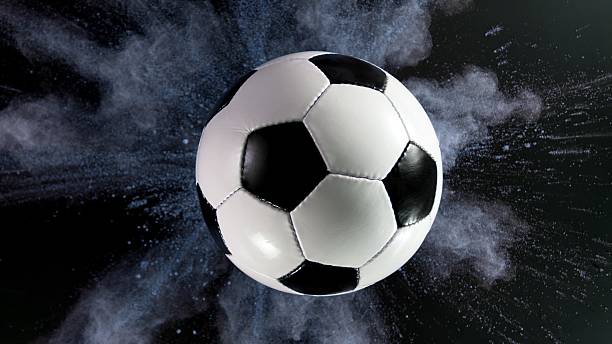 istock Soccer ball with coloured powder explosion. 2219639669