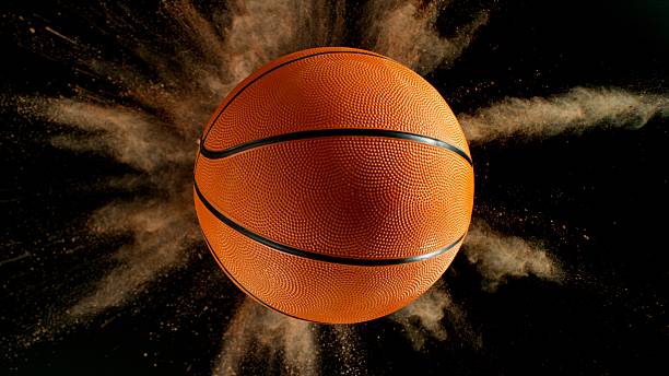istock Basketball ball with coloured powder explosion. 2219639671