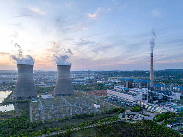 istock Thermal power plant generating electricity at night 2219639860