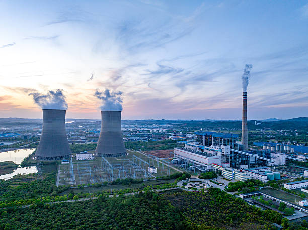 istock Thermal power plant generating electricity at night 2219639879