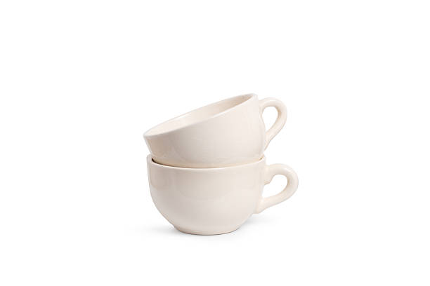 istock Two white cups isolated on a white background with copy space 2219640390