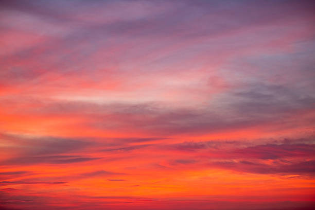 istock Sky,Beautiful sunset view, luxury soft gradient orange gold clouds and sunlight on the blue dramatic sky perfect for the background, morning, evening,Twilight, climate change,horizontal sunset photo 2219642111