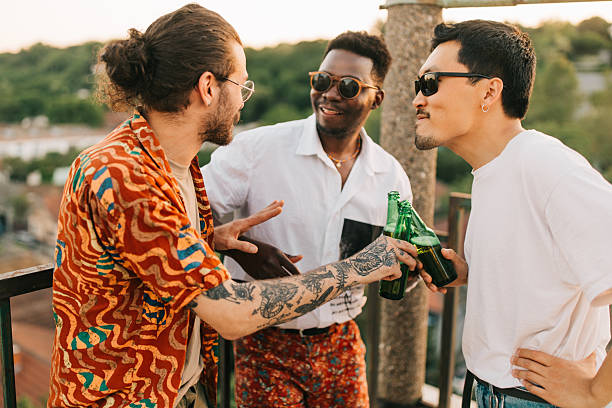 istock Men celebrate bachelor party on the roof. 2219644556