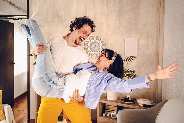 istock Happy couple enjoy at home 2219646521