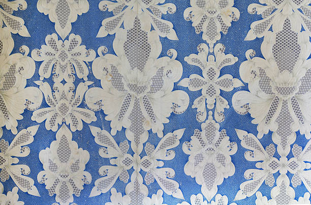 istock Old wallpaper on the wall. Old wallpaper for texture or background. 2219646954