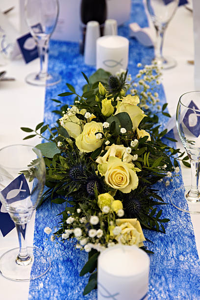 istock Flower bouquet for a Christian confirmation on a festively set table 2219648486