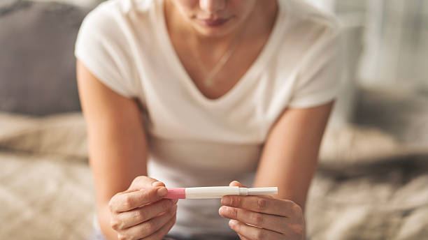 istock Woman waiting for pregnancy test result 2219650737