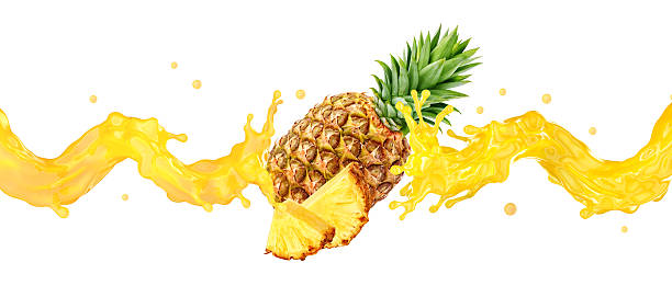 istock Whole pineapple and sliced pieces with juice splash isolated on white background. 2219654840