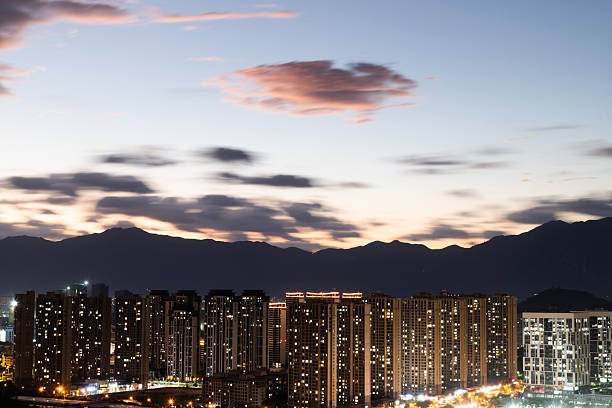 istock City buildings and sunset sky 2219656916