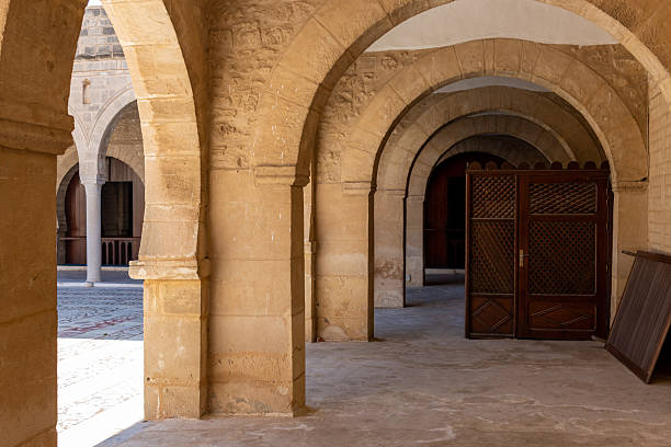 istock A stone hallway of Great Mosque is lined with arches. 2219658226