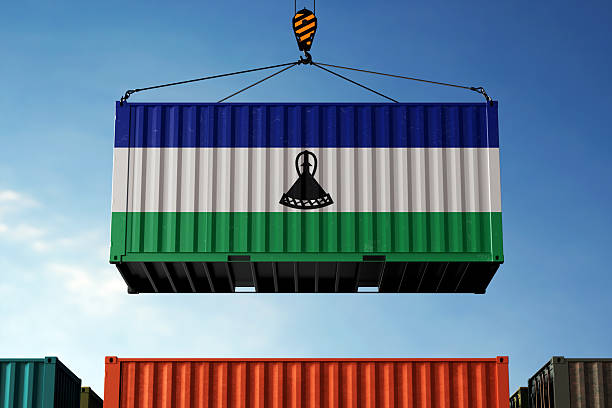 istock Lesotho trade cargo container hanging against clouds background 2219658623