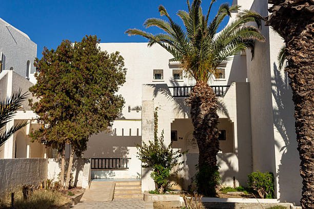 istock A sun-drenched Mediterranean street scene with white buildings 2219659775