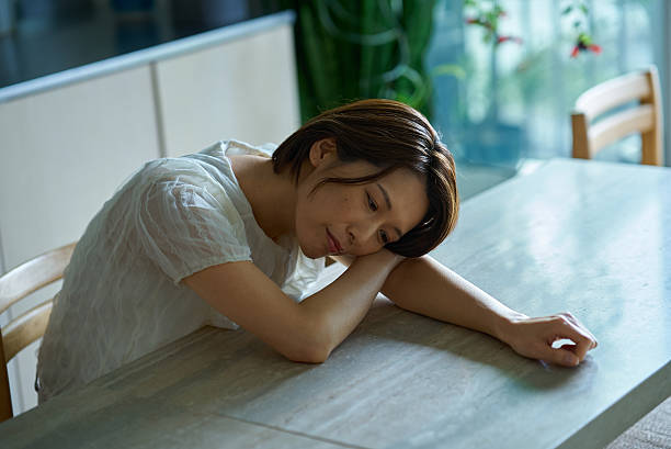 istock A middle-aged women feeling tired 2219667478