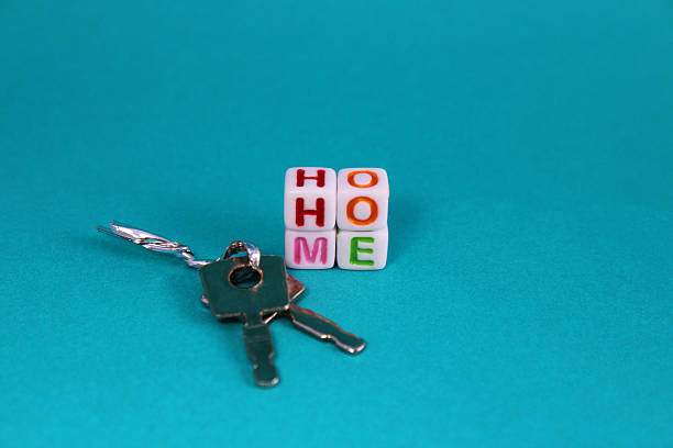 istock Keys next to blocks that form the word HOME 2219667929