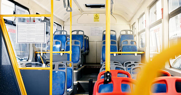 istock Travel, empty bus and public transportation with seats for commute, trip and urban excursion. Coach cabin, transit service and interior of metro for tourism or journey in vehicle with glass window 2219668380
