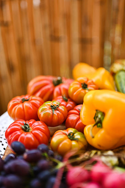Freshly picked vegetables creating a colorful composition on a wooden table