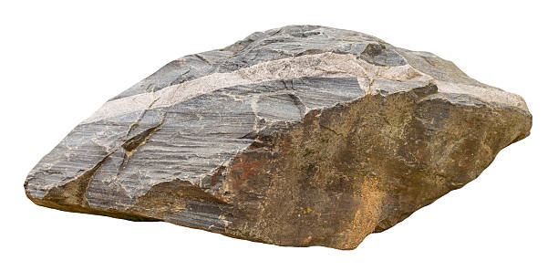 istock This large stone displays rugged and textured surface, isolated on white background. Its natural hues and formations highlight unique characteristics of geological materials. Front view, cut out rock. 2219674545