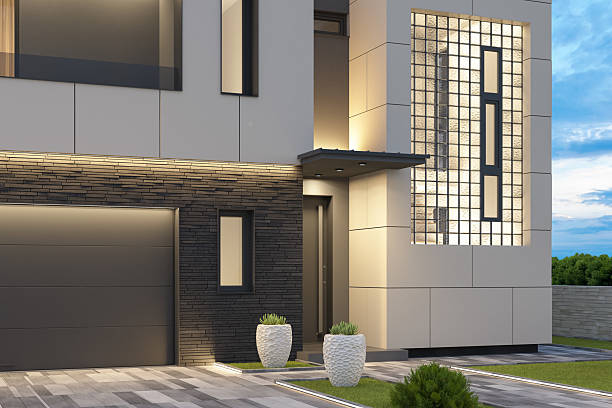 istock Modern Luxury Villa with Illuminated Pathway at Dusk 2219675395