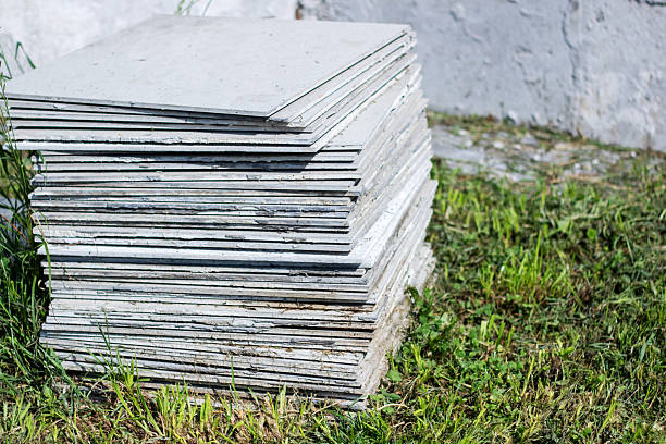 istock Concrete sheets are piled up on the grassy ground 2219677043