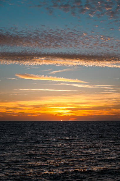istock Golden Sun Touching the Horizon in Venice Beach 2219677278