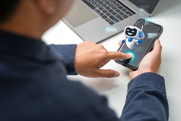 istock AI content creation tools: Man uses laptop with AI assistant for graphic design, translation, chatbot, image creation, coding, and advertising. 2219678634