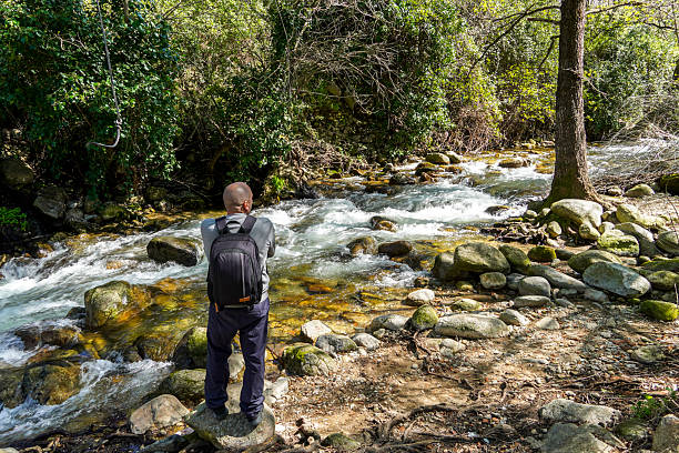 A man by the Ambroz River