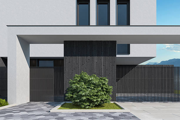 istock Modern Two-Story House with Black Stone Base and White Plaster Facade 2219681913