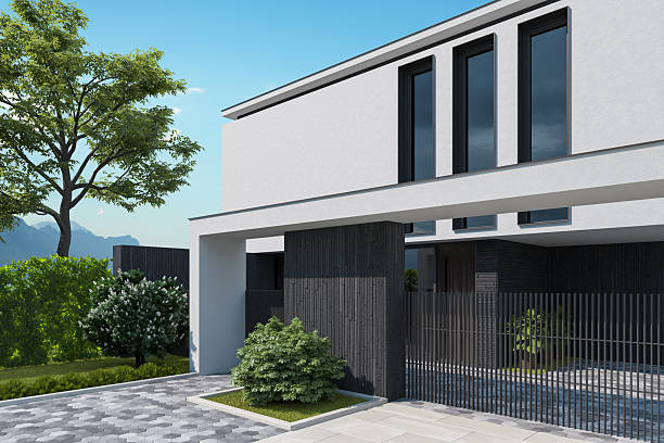 istock Modern Two-Story House with Black Stone Base and White Plaster Facade 2219681934