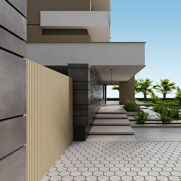 istock Modern Beige Apartment Building with Large White Terraces and Lush Greenery 2219683352